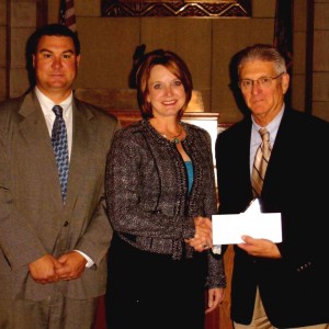 Pictured (L-R): Corey Steel, Nebraska court administrator; Julie L. Hurley, RMR, CRR; Chief Justice Michael Heavican