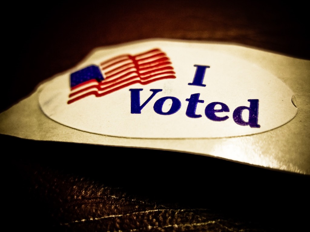 "I voted" sticker with American flag