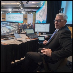 Patric Martin pauses for the camera while captioning the G-20 meeting