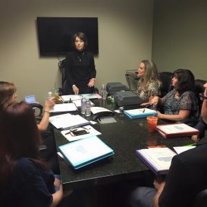 Doreen Sutton, RPR, explains the letters of the alphabet during an A to Z training session.