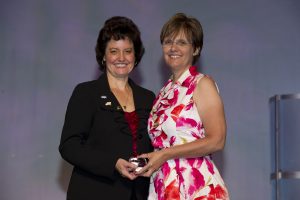 Jen Krueger, RMR, CRI, CPE, received the CASE Award of Excellence in 2011 from past NCRA President Melanie Humphrey-Sonntag, RDR, CRR, CRC