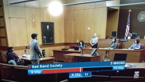 A courtroom scene on the television series "Red Band Society" -- Shelley Duhon is the court reporter behind the bench.