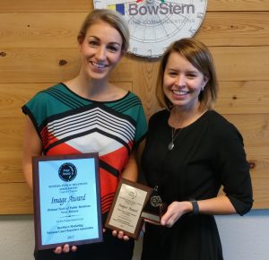 BowStern representatives Ashleigh Flanders and Amanda Handley hold three awards -- two plaques and a trophy