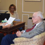 Michelle Houston, a captioner from Brandywine, Md., transcribes the war stories of U.S. Veteran Patrick O’Keefe, as told to volunteer interviewer Pat Mosunec during the VHP event held at the Ginger Cove Retirement Community in Annapolis, Md.