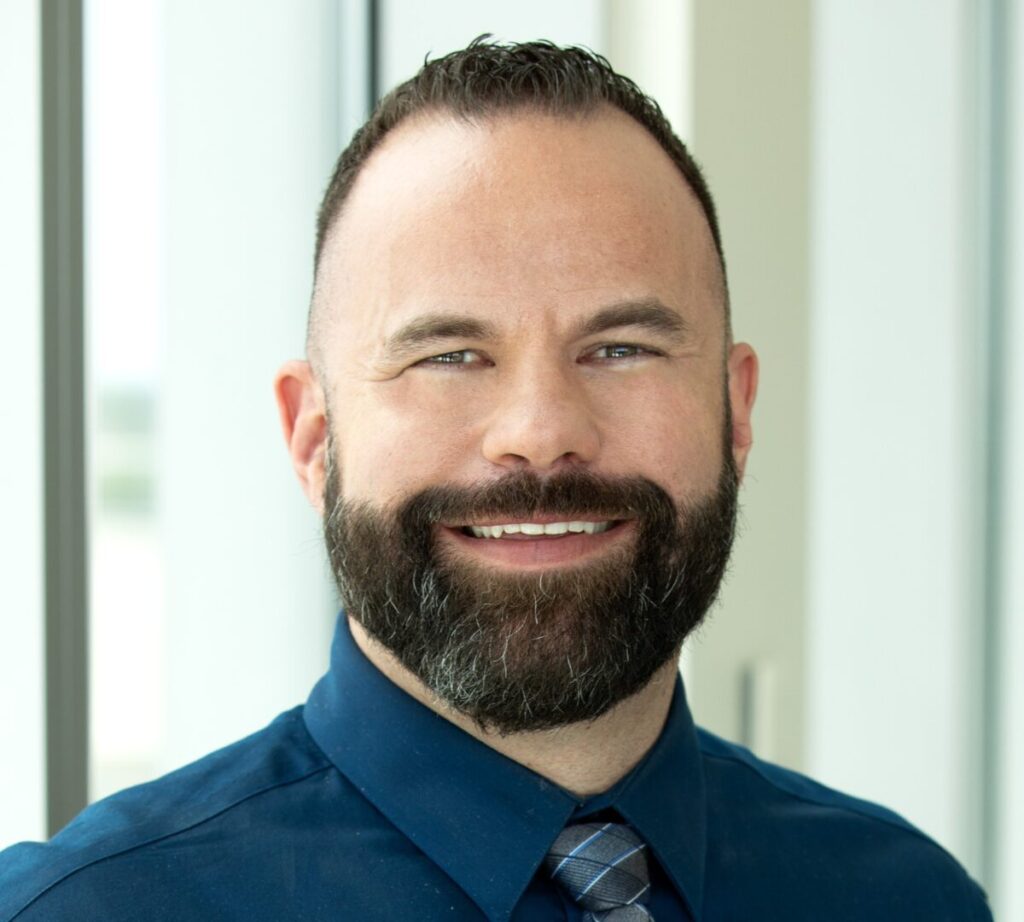 photo of bearded man, Mike Hesley, smiling