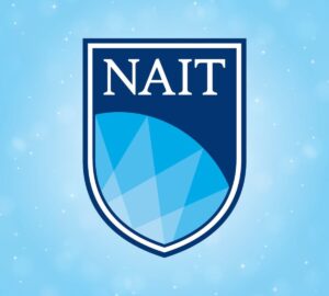Logo of NAIT (Northern Alberta Institute of Technology) featuring a dark blue shield with the text 'NAIT' in white at the top, and a geometric light blue design resembling a faceted gemstone or globe in the lower portion. The background is light blue with soft bokeh lights and small white stars.
