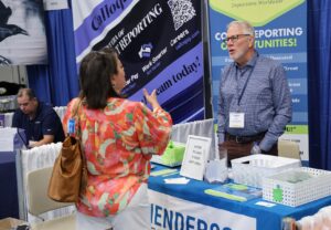 People talking in an expo hall