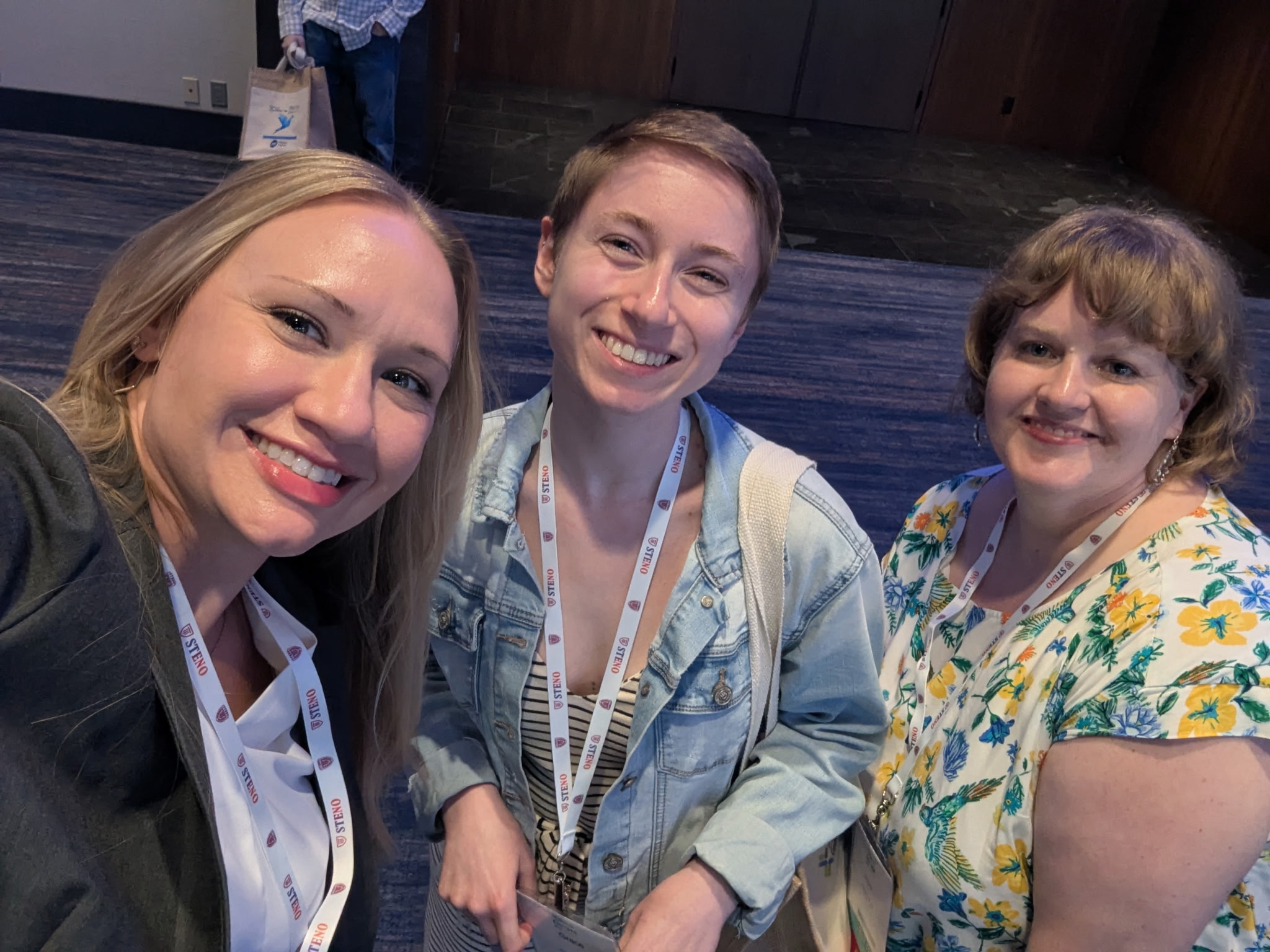 Three women posing for a selfie