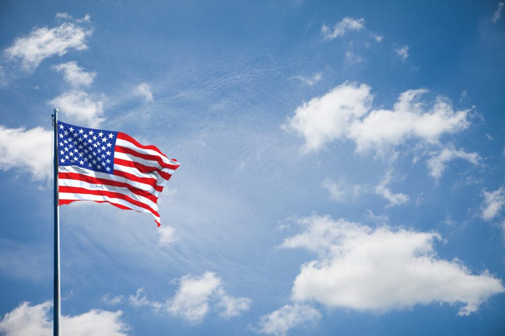 American flag against a blue sky