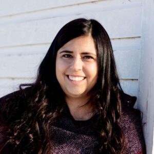 Woman smiling at a camera