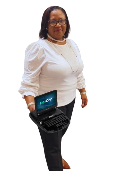 Woman in a white shirt standing and holding a steno machine