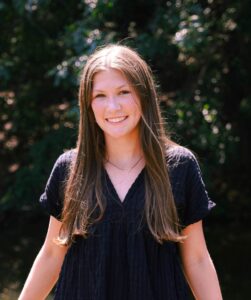 A professional headshot or a woman
