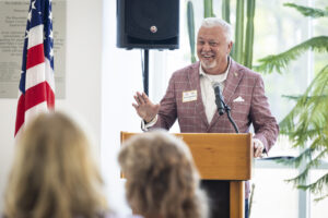 A man speaking at a podium