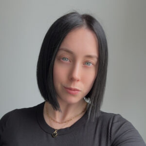 Headshot of a woman with short brown hair