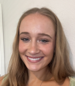 Headshot of a woman with blond hair smiling