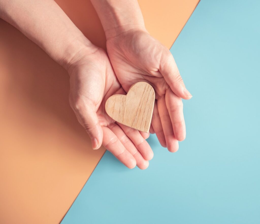 Hands holding a heart